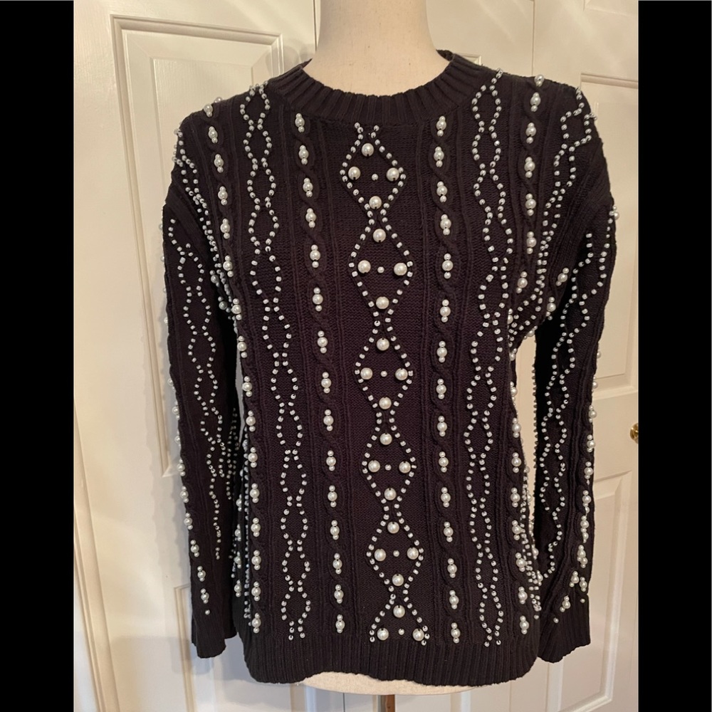 Pearl and black sweater